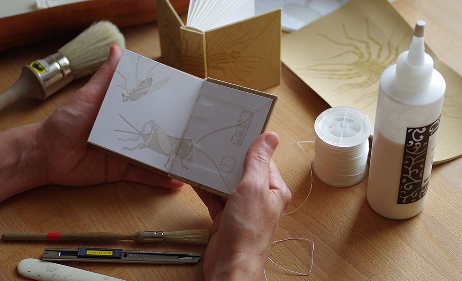 photo of bookbinding by hand